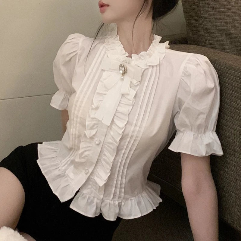 Blusa Branca Manga Bufante com Babados — foto 3